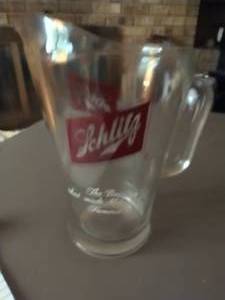 lot 887 image: Schlitz Beer Pitcher.