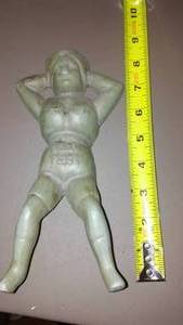 lot 909 image: Nells Place Cast Figure.
