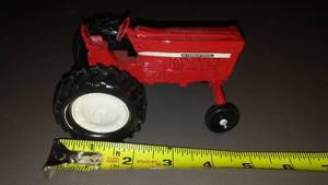 lot 671 image: International Tractor Die Cast.