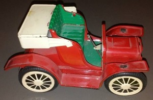 lot 962 image: Tin Antique Automobile.  Moves Well.