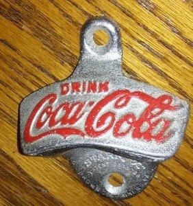 lot 82 image: Coca Cola Bottle Opener. Authentic.