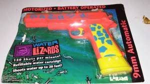 lot 14 image: Battery Water Pistols (2). New in wrapper.