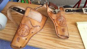 lot 120 image: Hubley Cowpoke Cap Gun And Leather Holster.