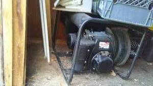 lot 134 image: Woodshed Contents. Includes Homelite 4300 watt generator