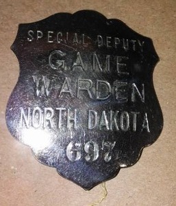 lot 146 image: Game Warden Pin