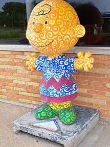 lot 413 image: Swirlie Charlie - Charlie Brown Around Town - St. Pauls Tribute to Charles M. Schulz theme by Sarah Nevins Concrete Statue