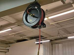 lot 421 image: Central Pneumatic Retractable Air Hose Reel with 50 Air Hose
