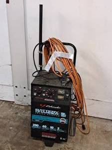 lot 428 image: Schumacher Battery Charger Engine Starter SE 4022 with Extension Cord