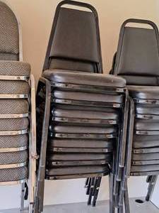 lot 570 image: Lot of (7) PaddedMetal Stackable Conference Chairs