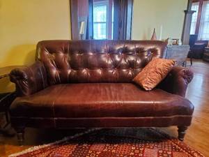 lot 10 image: Leather Tufted Sofa