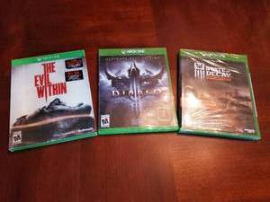 lot 49 image: Three Xbox One Games