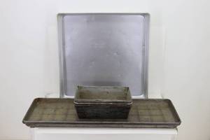 lot 14 image: (2) 8x25 (4) Bread Pans (1) 1616 Pan