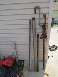 lot 68 image: Antique Hand Pump with 3 Well Screens