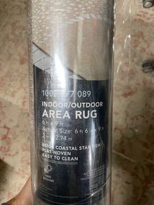 lot 53 image: New Beige 6 ft. x 9 ft. Coastal Star Fish IndoorOutdoor Patio Area Rug