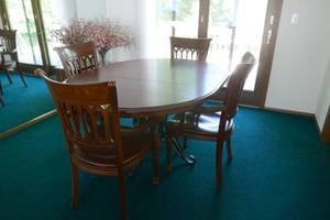 Very Nice solid wood table with iron legs and 4 solid wood chairs