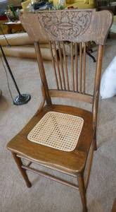 Nice spindle back wood chair with new caning on the seat
