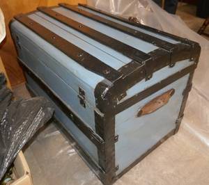 Painted blue and black vintage trunk with leather handles