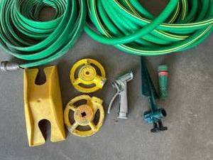 lot 47 image: Garden Hoses and Reel, Sprinklers and Sprayer