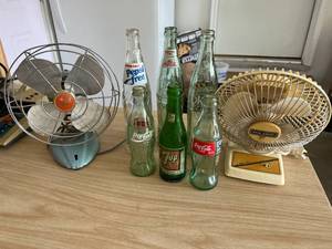 lot 59 image: Vintage Coke, Pepsi, 7up Bottles and 2 Vintage Fans