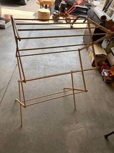 lot 71 image: Collapsable Clothes Dryer and Curtain Rod