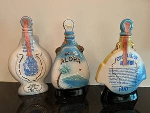 lot 27 image: Lot of 3 Vintage Beam Decanters