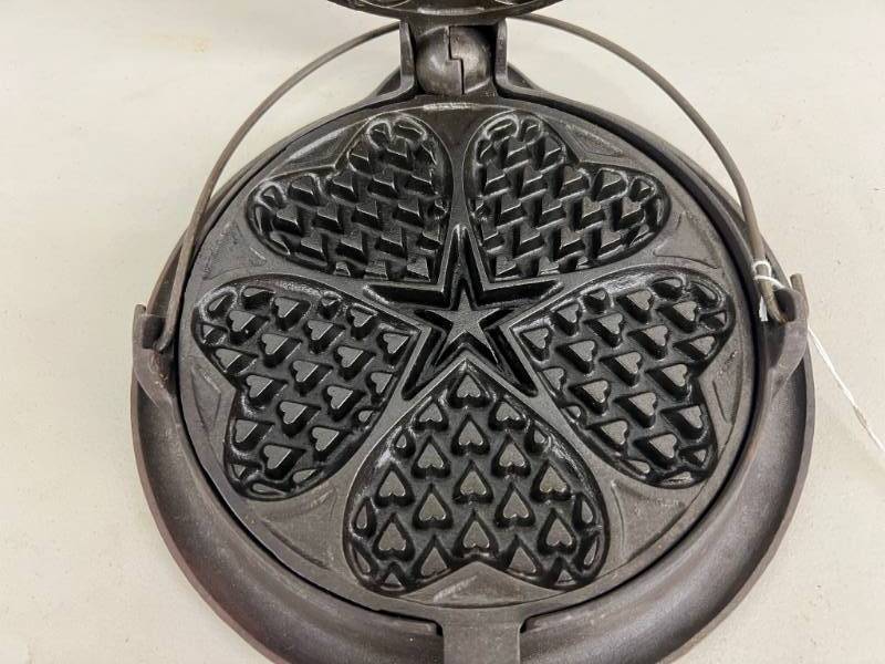 Sold at Auction: GRISWOLD CAST-IRON HEART STAR WAFFLE MAKER