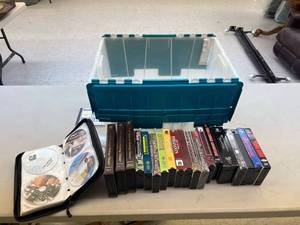 lot 213 image: Tote of Hunting & Misc VHS & DVDs