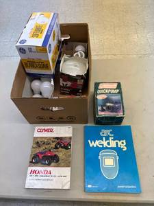 lot 225 image: Coleman Quickpump, Lightbulbs & Honda Manual