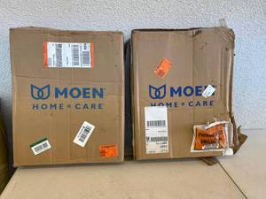 lot 280 image: 2 - Moen Wallmount Teak Shower Chairs