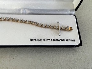 lot 321 image: Womens Genuine Ruby & Diamond Accent Tennis Bracelet 18 KT Gold over Sterling Silver