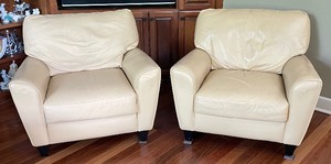 lot 9 image: Pair of Leather Chairs with Ottomans