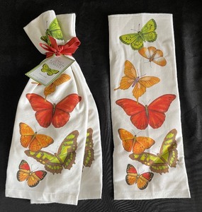 lot 93 image: Darling New Dishtowels and a Tablecloth
