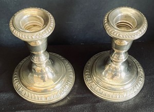 lot 165 image: Pair of Sterling Silver Weighted Candle Holders