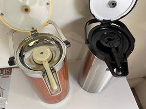 lot 234 image: Pair of Air Pots by Apollo and Zojrushi