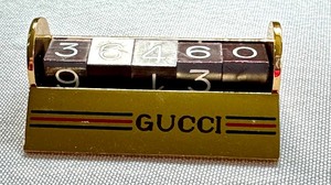 lot 177 image: Vintage Gucci Perpetual Desk Calendar