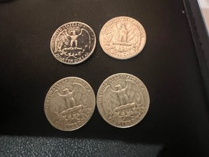 lot 25 image: LOT OF 4 SILVER QUARTERS FROM 1960S