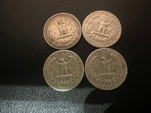 lot 21 image: LOT OF 4 SILVER QUARTERS FROM 1960S