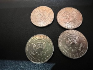 lot 31 image: LOT OF 4 NIFC KENNEDY HALF DOLLARS