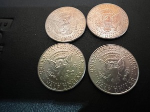 lot 33 image: LOT OF 4 NIFC KENNEDY HALF DOLLARS