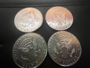 lot 46 image: LOT OF 4 NIFC KENNEDY HALF DOLLARS