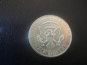 lot 61 image: 1964 KENNEDY HALF DOLLAR  90% SILVER