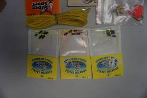 lot 107 image: Assorted Fishing Hooks, Jigs, Bobber Stops and Stringer