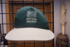 lot 124 image: Team Daiwa Fishing Vest, Zercom Maring Baseball Cap, Fish Head Can Coozie