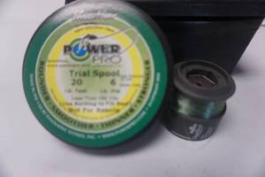 lot 128 image: Berkley Strike Small Plastic Storage Container With 20 lb Test Line and Pinacle Reel Head