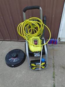 Ryobi pressure washer. 3300 psi with hose, wand & concrete cleaner. As shown. THIS ITEM HAS A RESERVE.