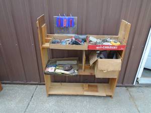 lot 101 image: Shelf of misc tools. Tape measures, magnets, staplers & 38w x 2h x 9d shelf. As shown.