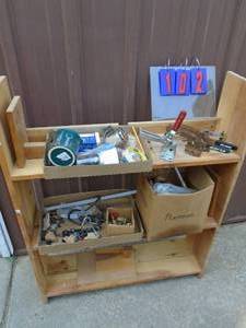 lot 102 image: Shelf of toggle clamps, office supplies, air hose fittings & 34w x 42h x 9d shelf. As shown.