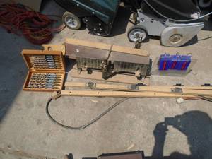 lot 111 image: Vintage miter saw. Approx 10 of wall plugs & box of brace bits. As shown.