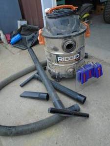 lot 117 image: Rigid shop vac with hose & ends. Right out of the shop. As shown.