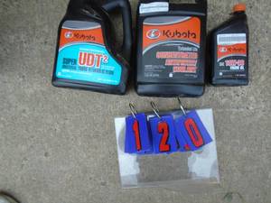 lot 120 image: Kabota oil, trans fluid & anti freeze. Full or nearly full. As shown.